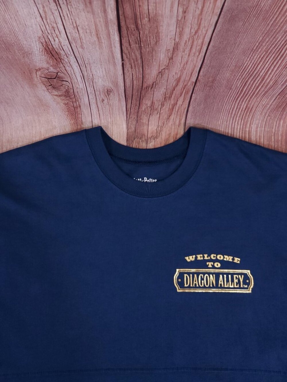 Harry Potter Wizarding World Spirit Jersey Shirt Large Navy Gold Diagon Alley - Picture 4 of 13